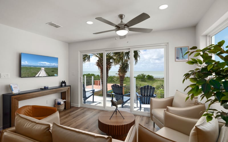 Upstairs Great Room with Bay and Island Views
Comfy seating for 5 and Dining for 6
Steps out to the Balcony